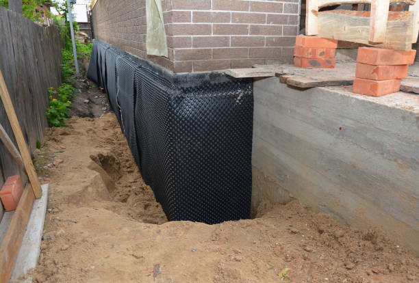 SJ Waterproofing Pros technician performing targeted Waterproofing assessment in Oak Ridge, TN